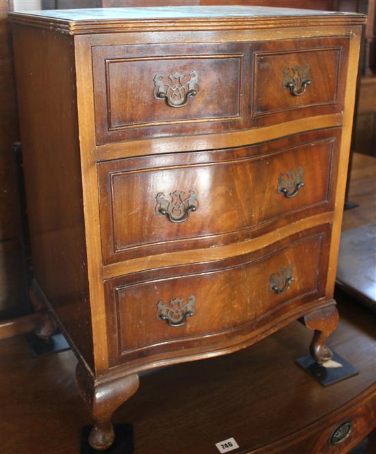 Small serpentine front chest of drawers